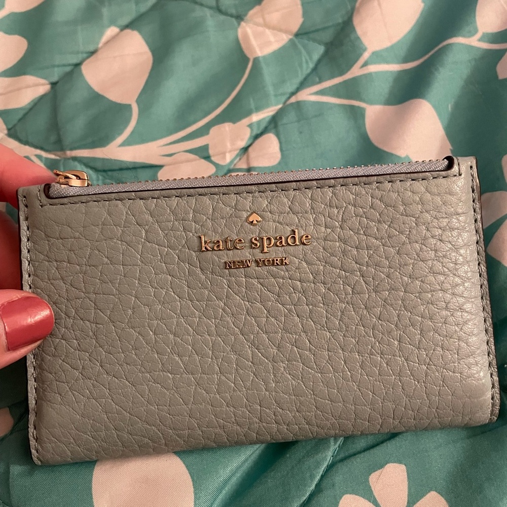 Kate Spade New York small slim bifold wallet.